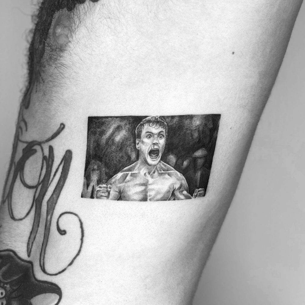 Single needle/fine line Jean Claude van Damme portrait tattoo done by Kane Navasard in Los Angeles.