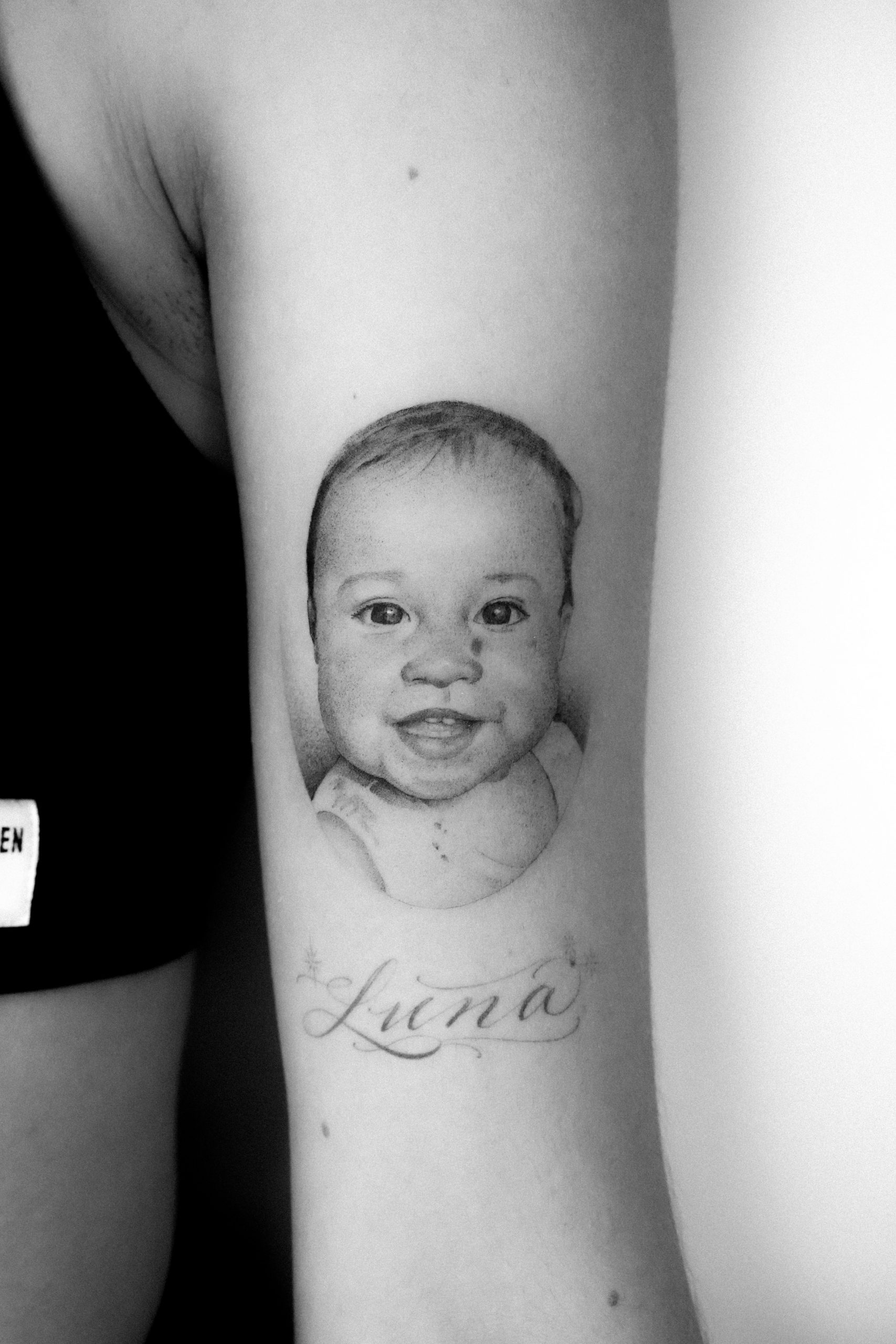 Fine line baby portrait done by Kane Navasard