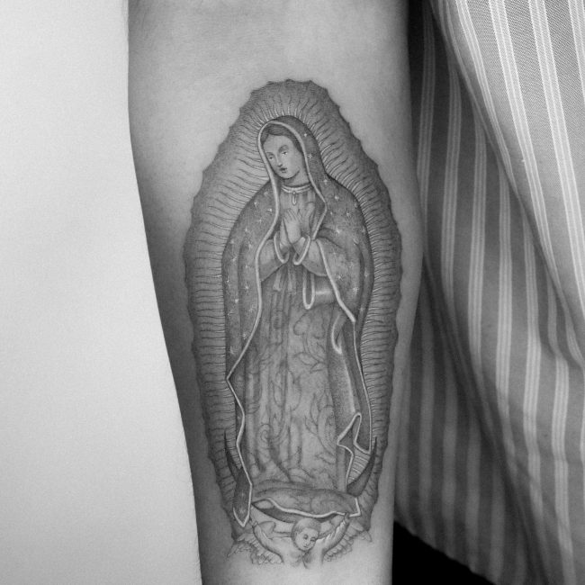 Fine line Virgin Mary Tattoo by Kane Navasard done in LA